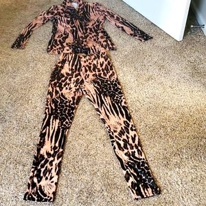 Two Piece legging Cheetah print suit. Size Medium.